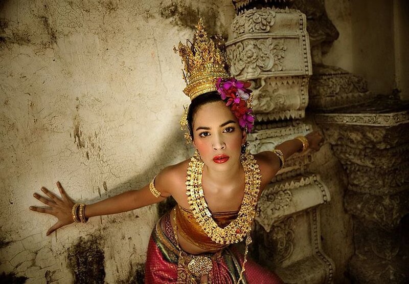Woman in Traditional Costume — Gold, Dramatic
