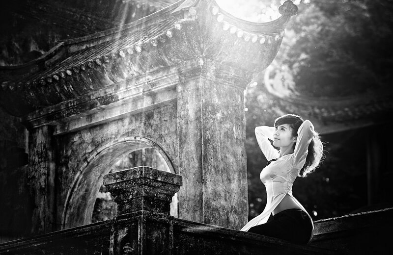 Woman in traditional dress at ancient temple