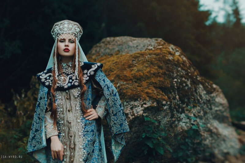 Woman in Traditional Dress — Blue, Dramatic, Photograph, Rock