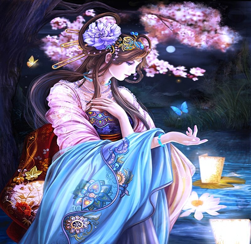woman in traditional dress by water