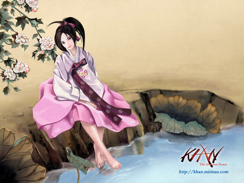Woman in traditional dress by water