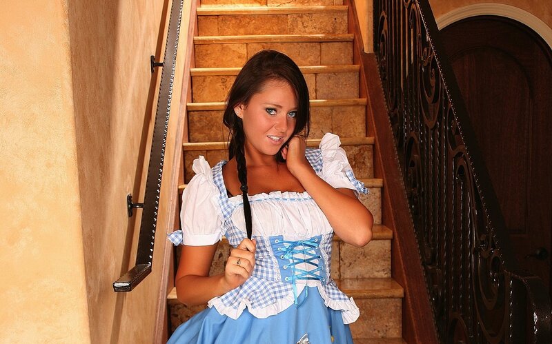 Woman in traditional dress on stairs