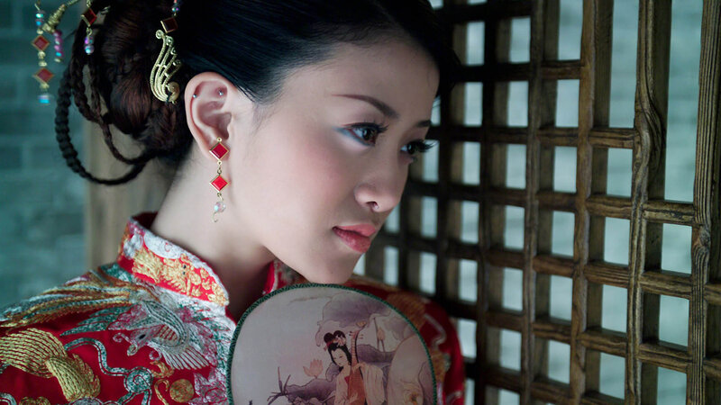 Woman in Traditional Dress — Red, Contemplative