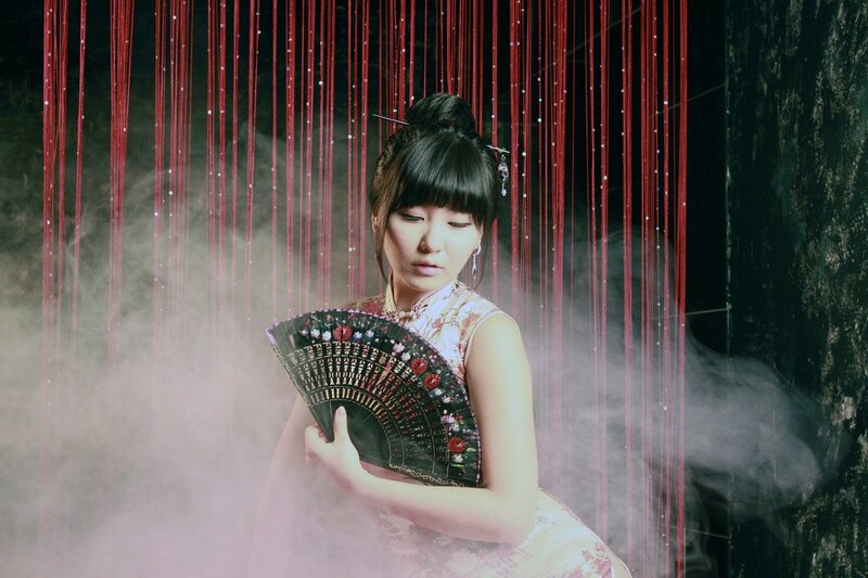 Woman in Traditional Dress — Red, Dramatic, Night, Photograph, Fan, Strings