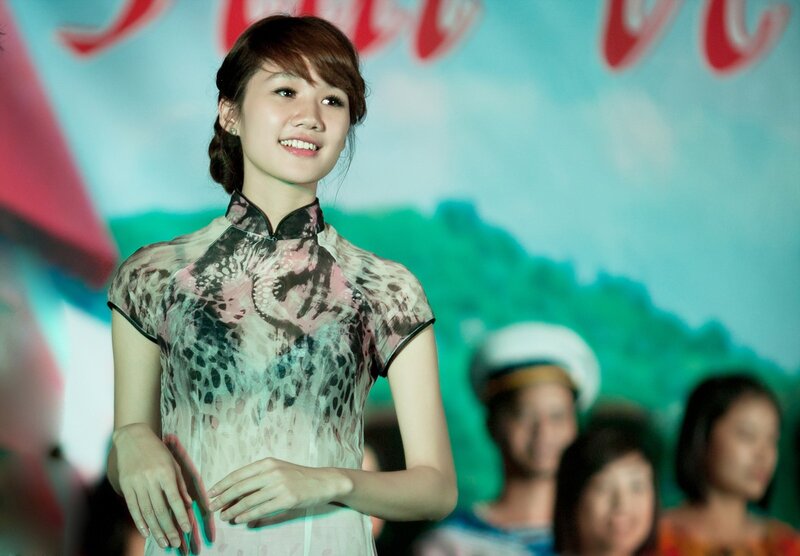 woman in traditional dress smiling