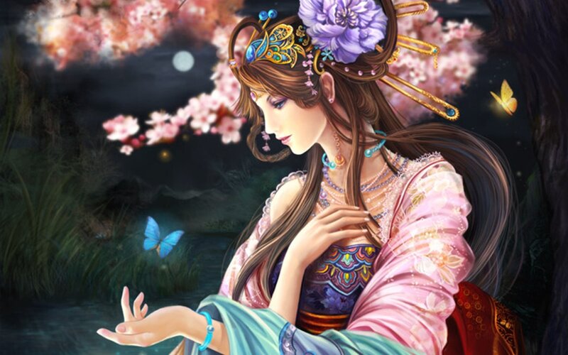 woman in traditional dress under cherry blossoms
