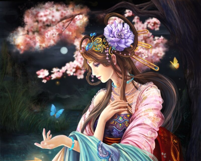 woman in traditional dress under cherry blossoms