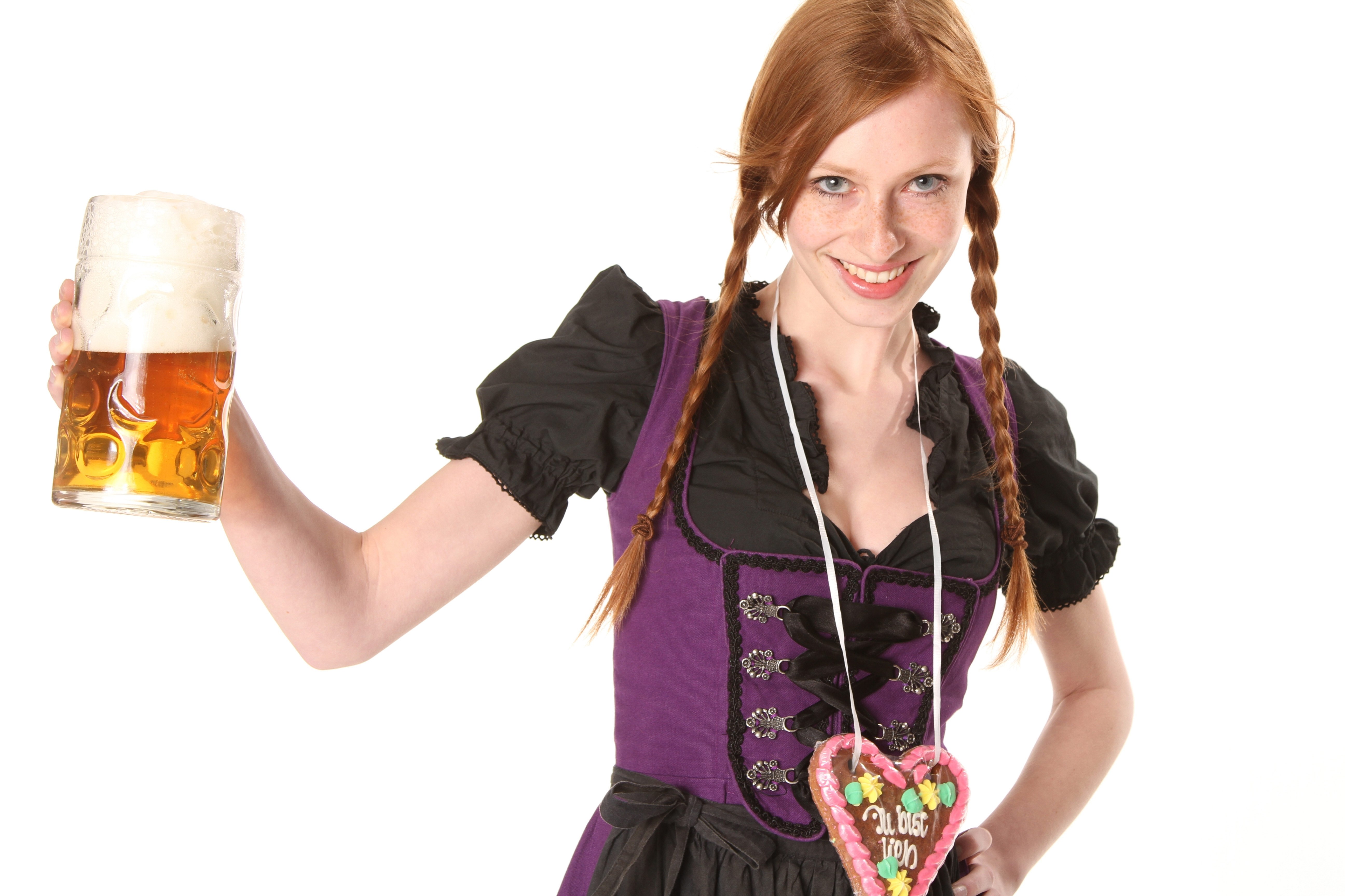 Woman in traditional dress with beer