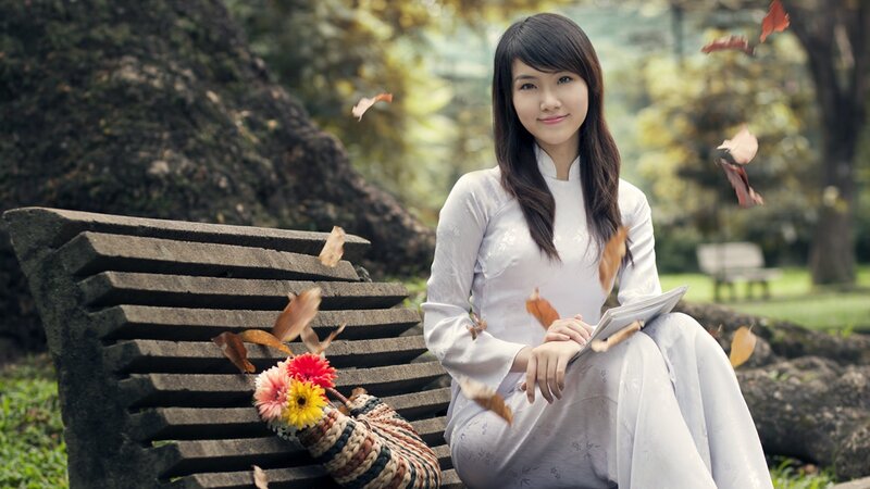 Woman in traditional dress with flowers