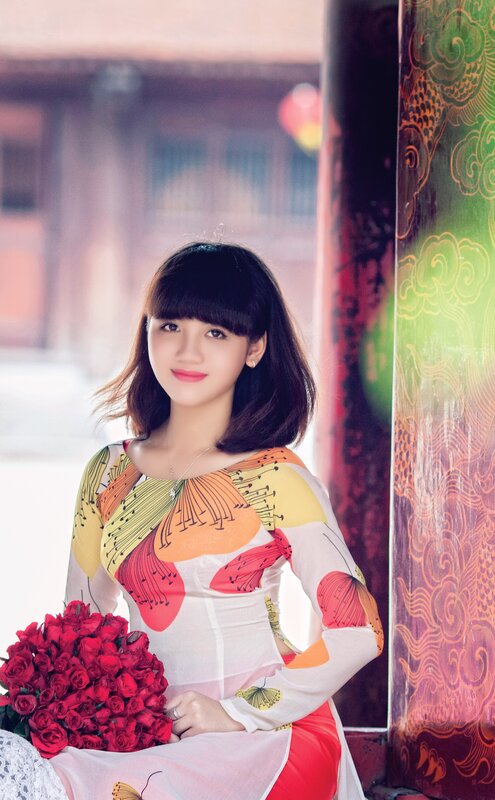 Woman in traditional dress with roses