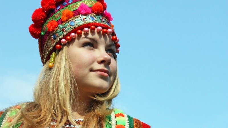 woman in traditional hat