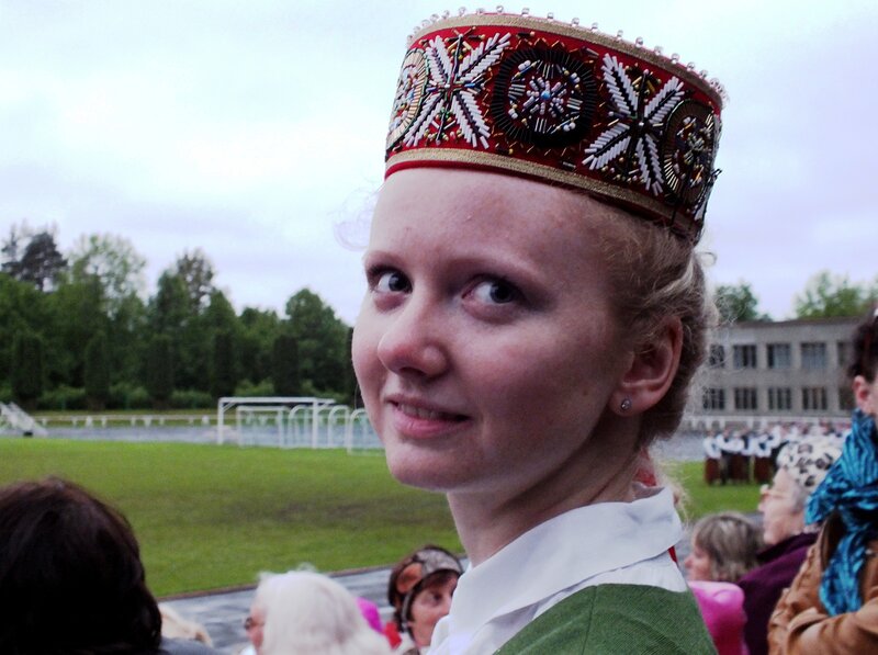 Woman in Traditional Hat — Red