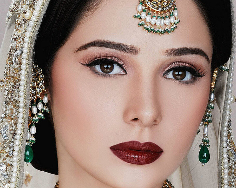 Woman in Traditional Jewelry — White, Dramatic