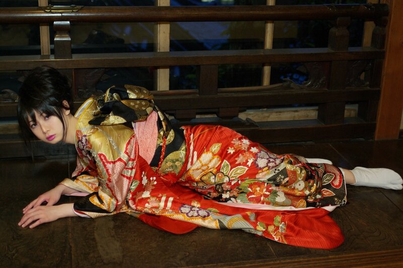 Woman in traditional kimono lying down