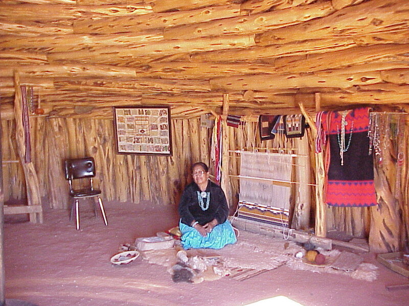 Woman in traditional weaving room