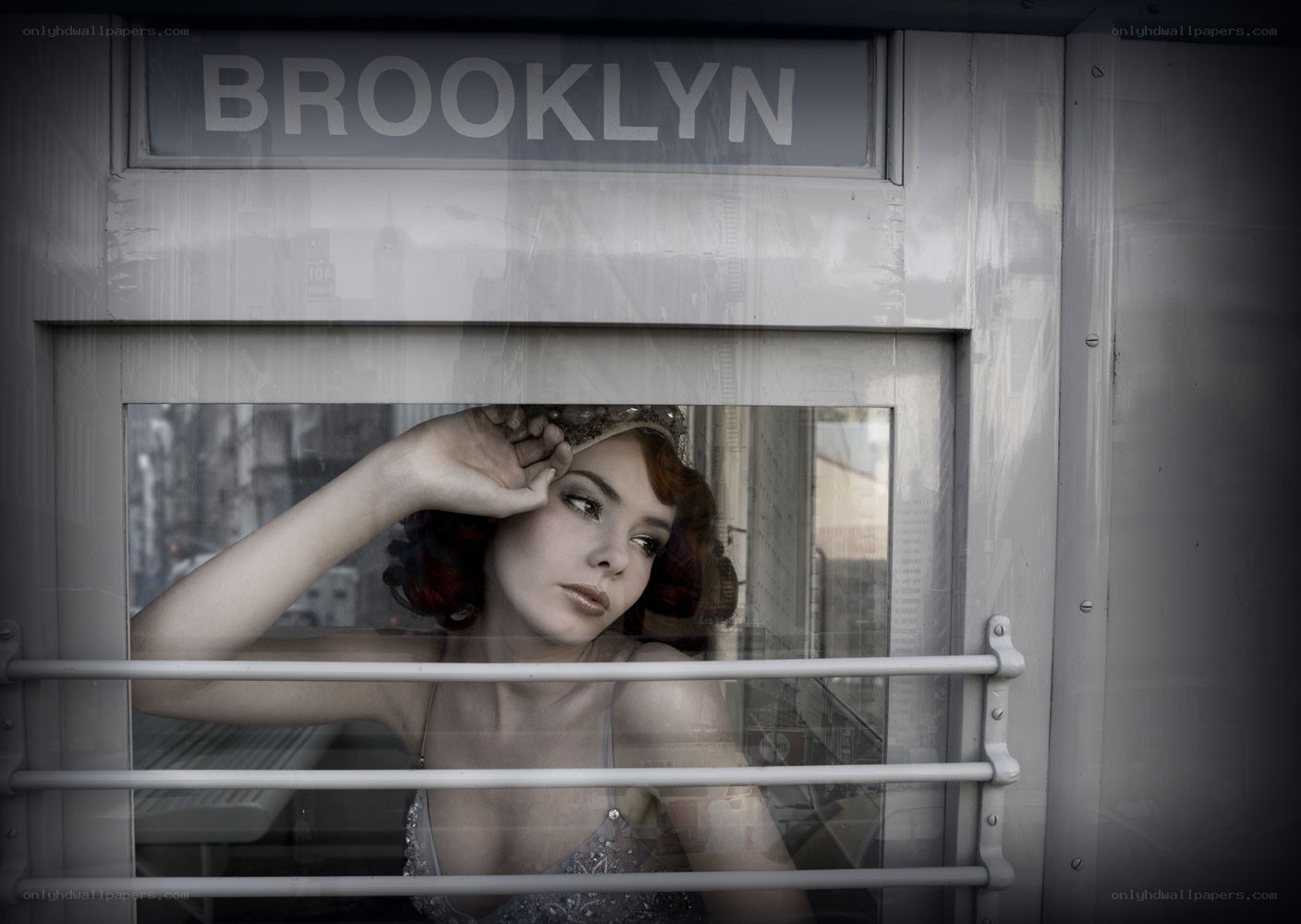 Woman in train window