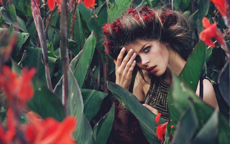 woman in tropical foliage
