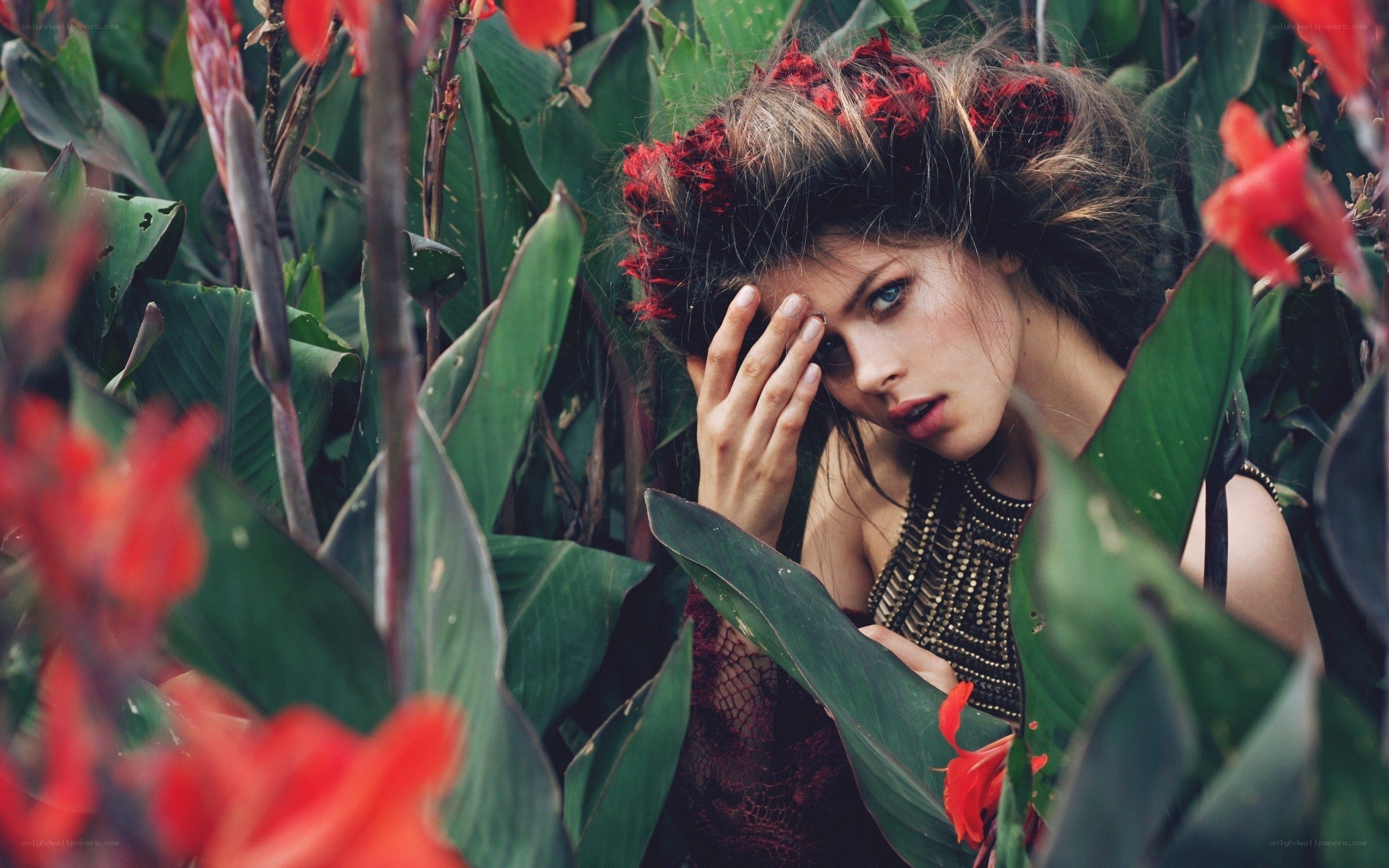 woman in tropical foliage