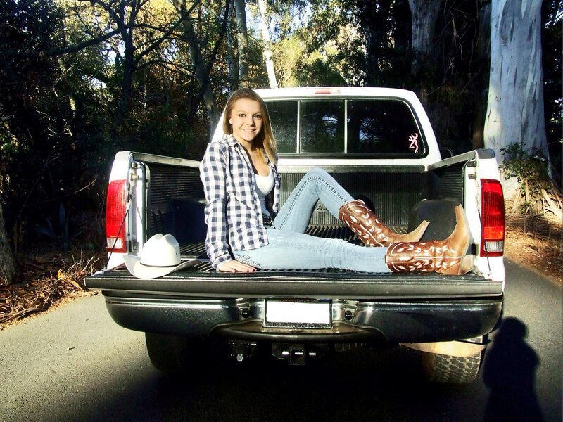 Woman in Truck Bed — White