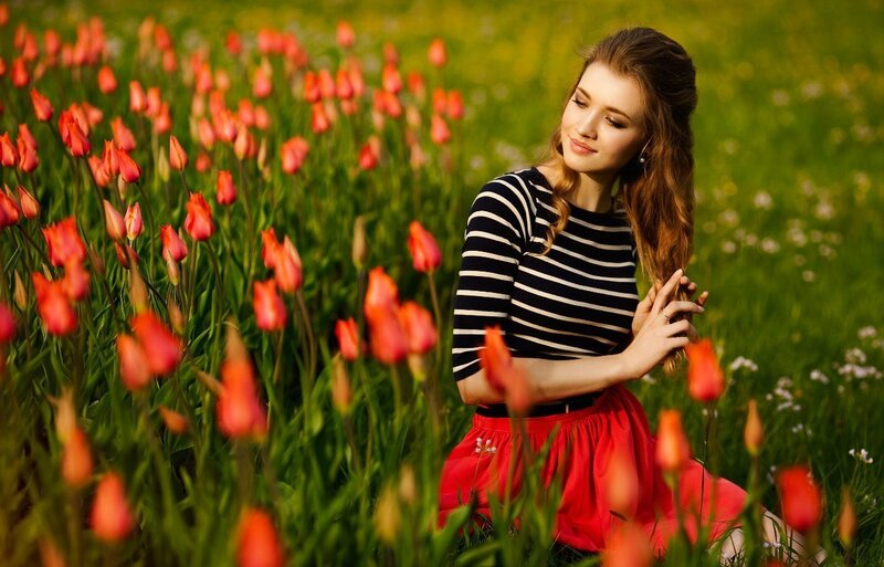 Woman in Tulip Field — Red, Serene