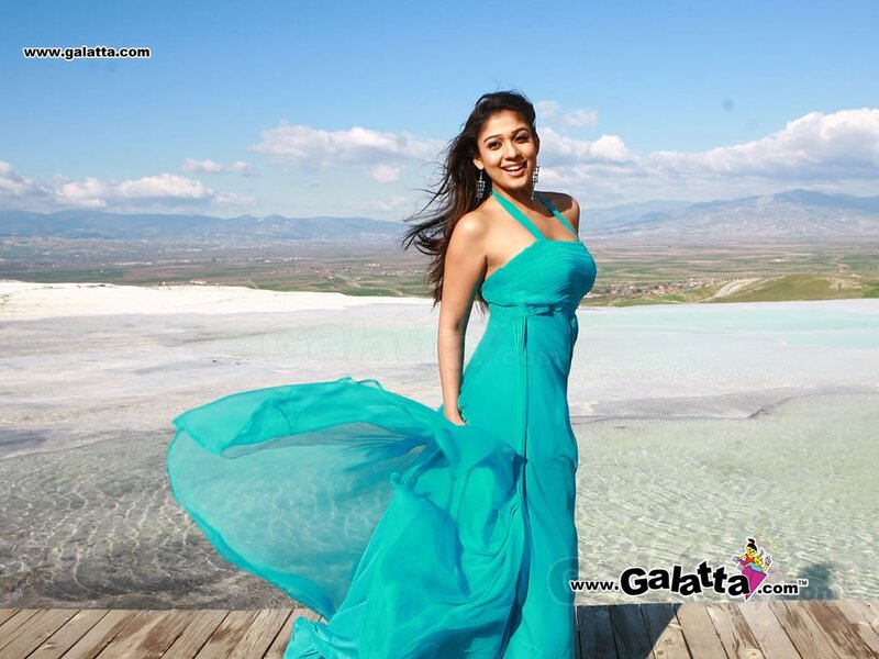 Woman in turquoise dress at travertine pools