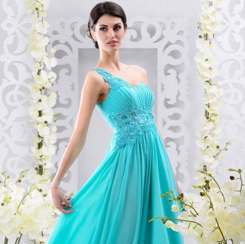 Woman in Turquoise Dress — Elegant