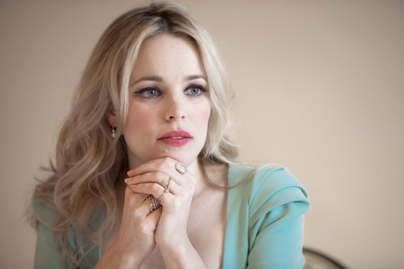 woman in turquoise top