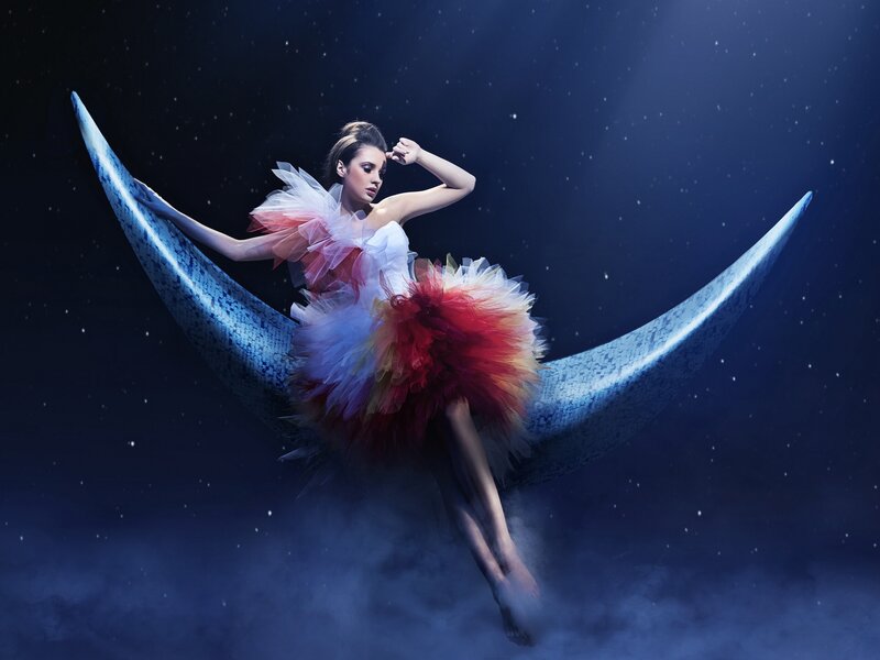 Woman in Tutu on Crescent Moon