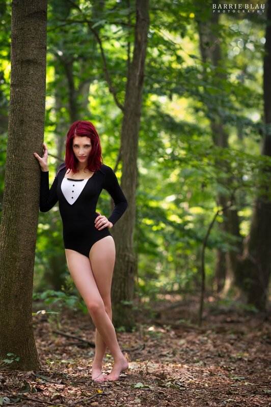 woman in tuxedo bodysuit
