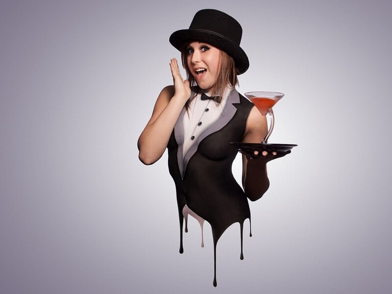 Woman in tuxedo costume
