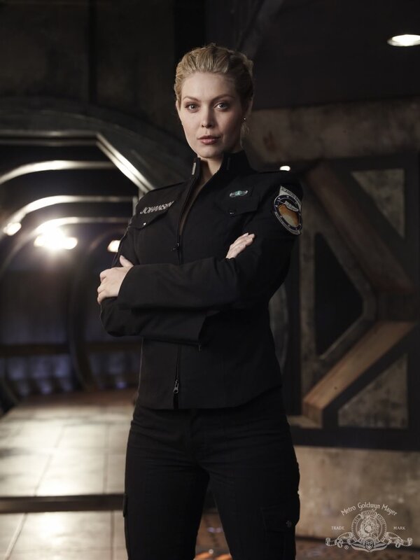 Woman in Uniform — Black, Serious, Photograph, Arms Crossed