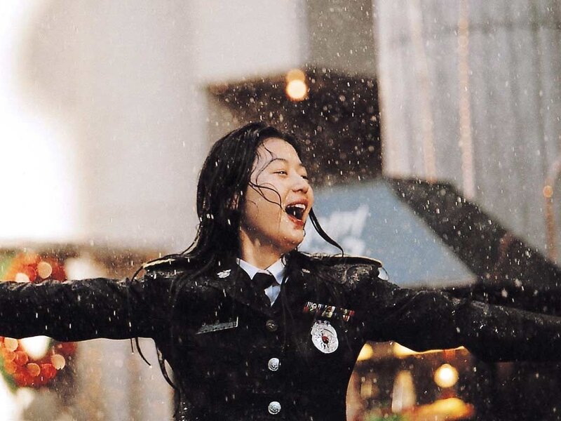 woman in uniform in rain