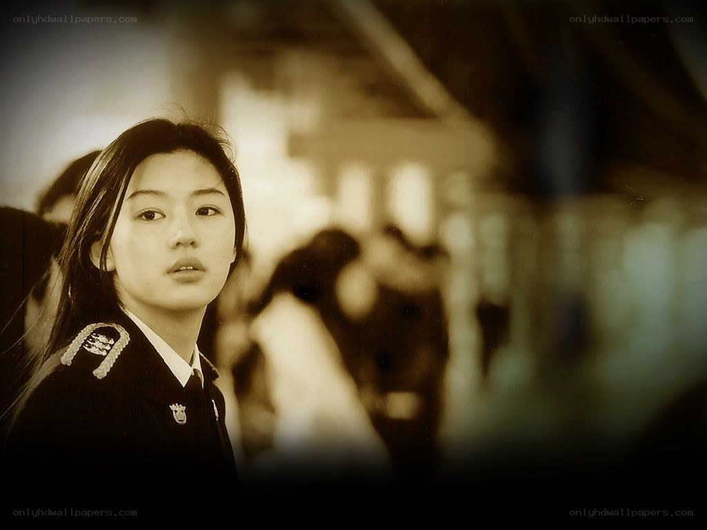woman in uniform looking away