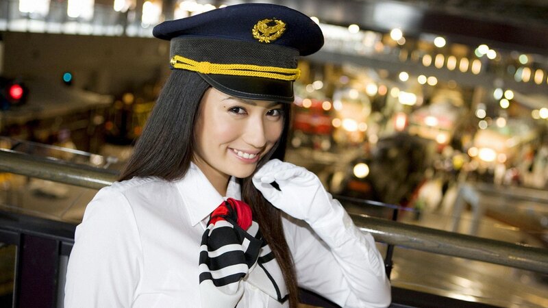 woman in uniform smiling