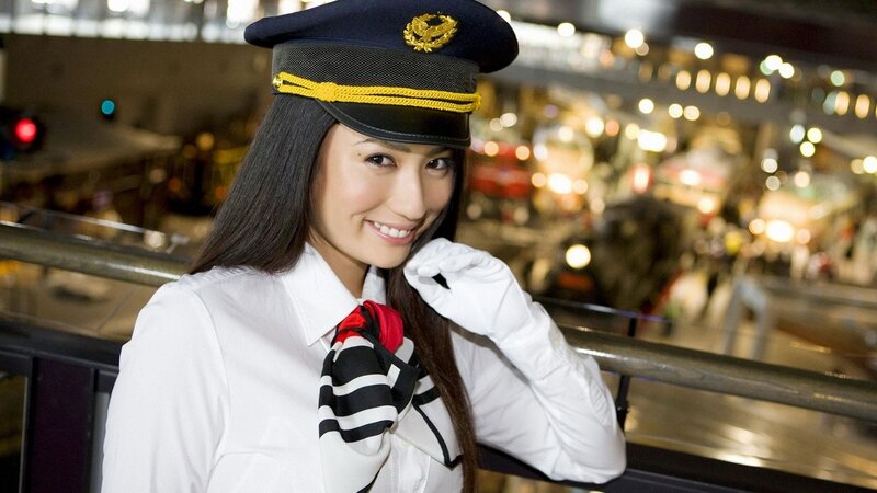 woman in uniform smiling