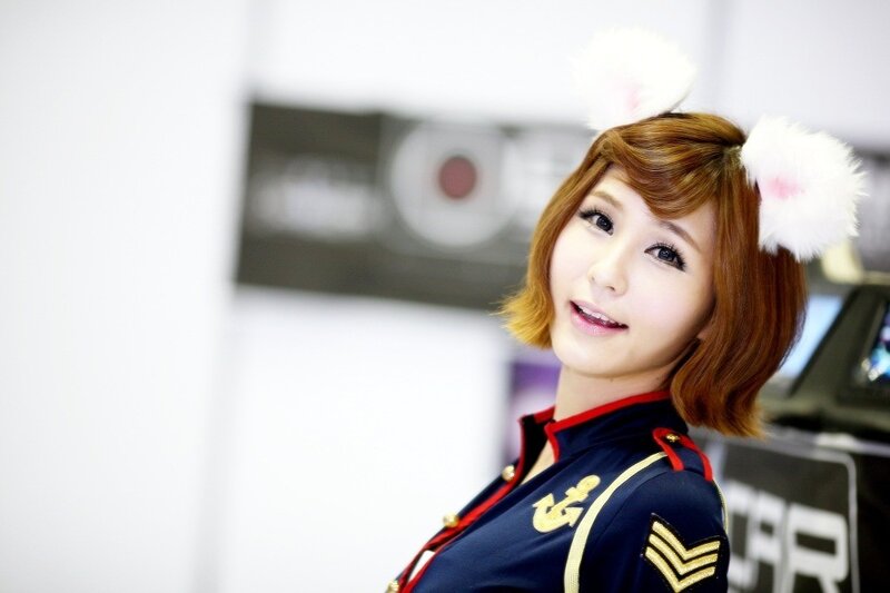 woman in uniform with bunny ears