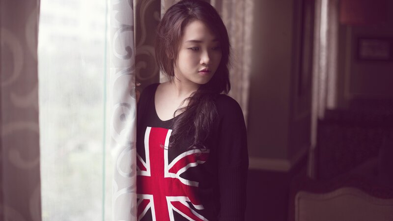 woman in union jack sweater