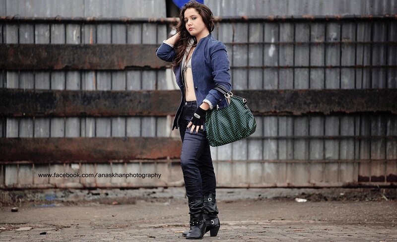 woman in urban setting with bag