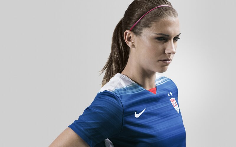 woman in usa soccer jersey