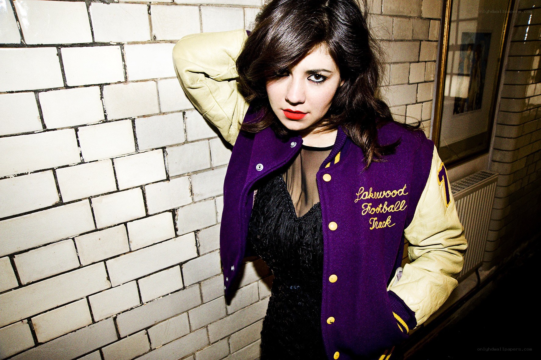 woman in varsity jacket
