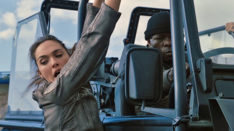 woman in vehicle with gun