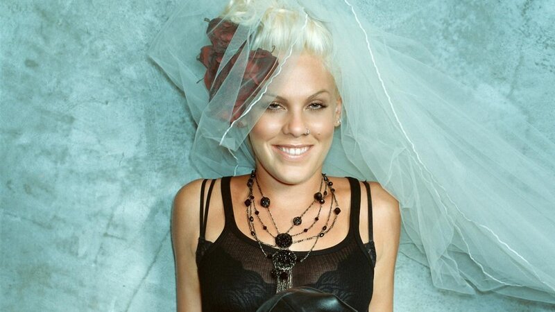 woman in veil and black top