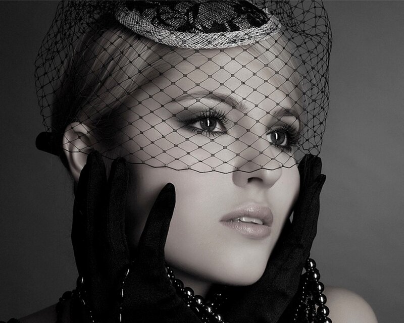 woman in veil and gloves