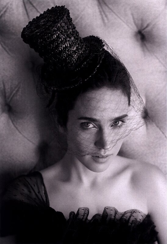 woman in veil and hat
