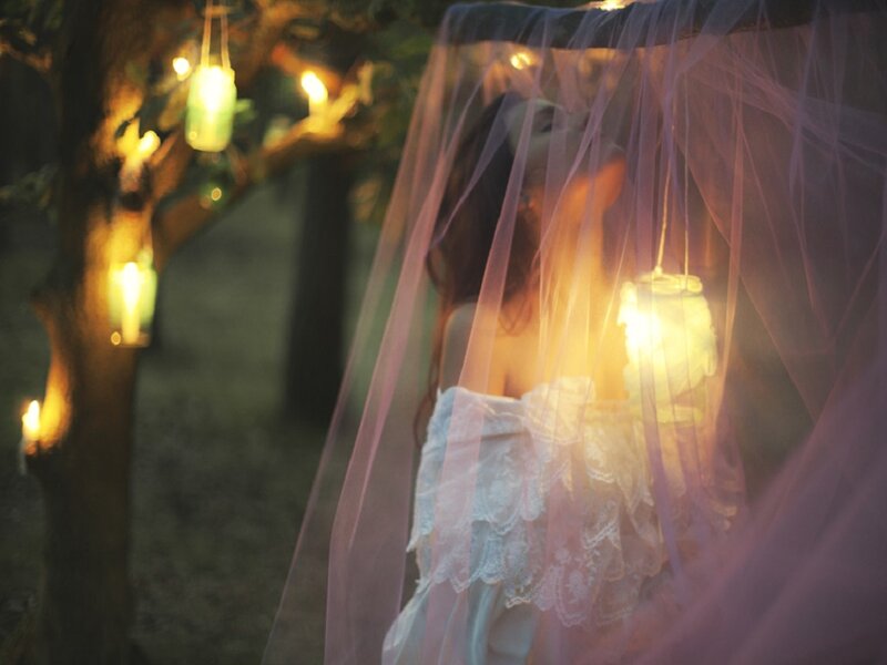 Woman in Veil at Night