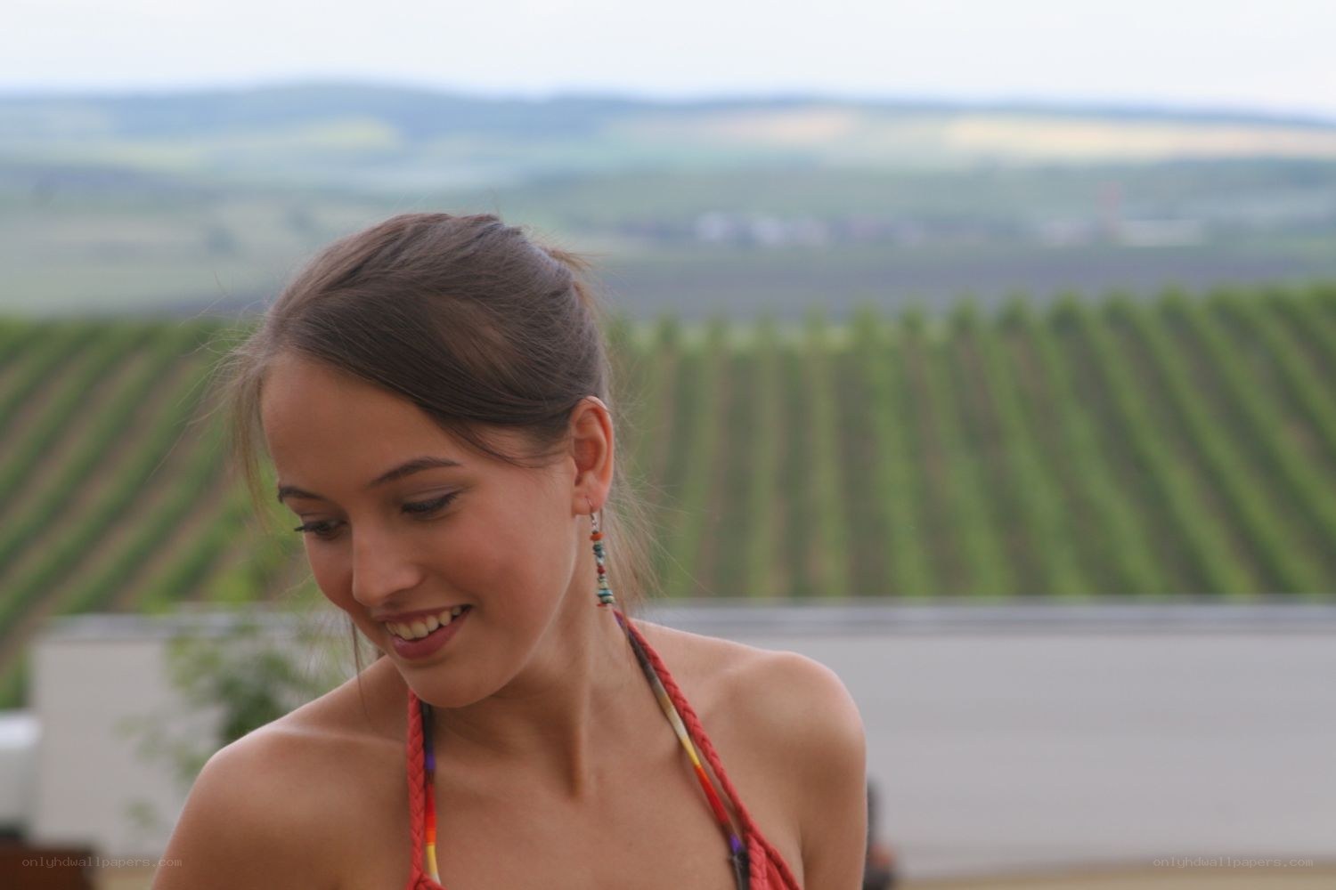 Woman in vineyard landscape