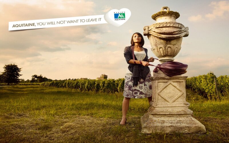 Woman in vineyard with urn