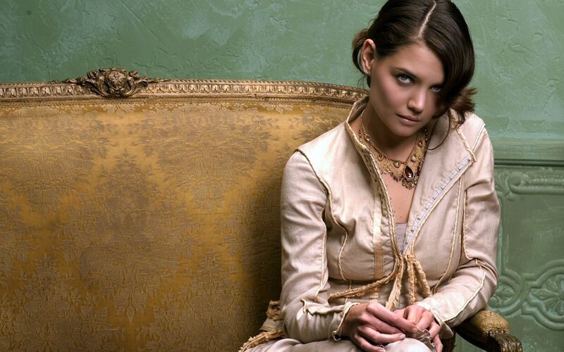 woman in vintage attire on sofa