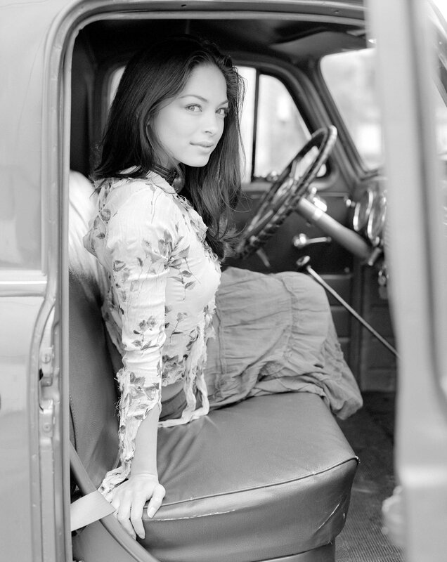 woman in vintage car