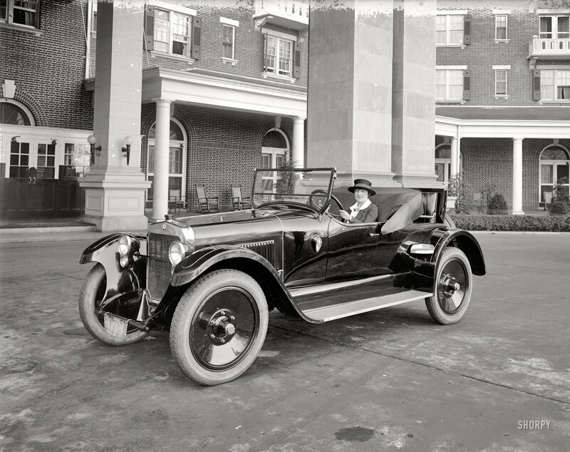 Woman in vintage car